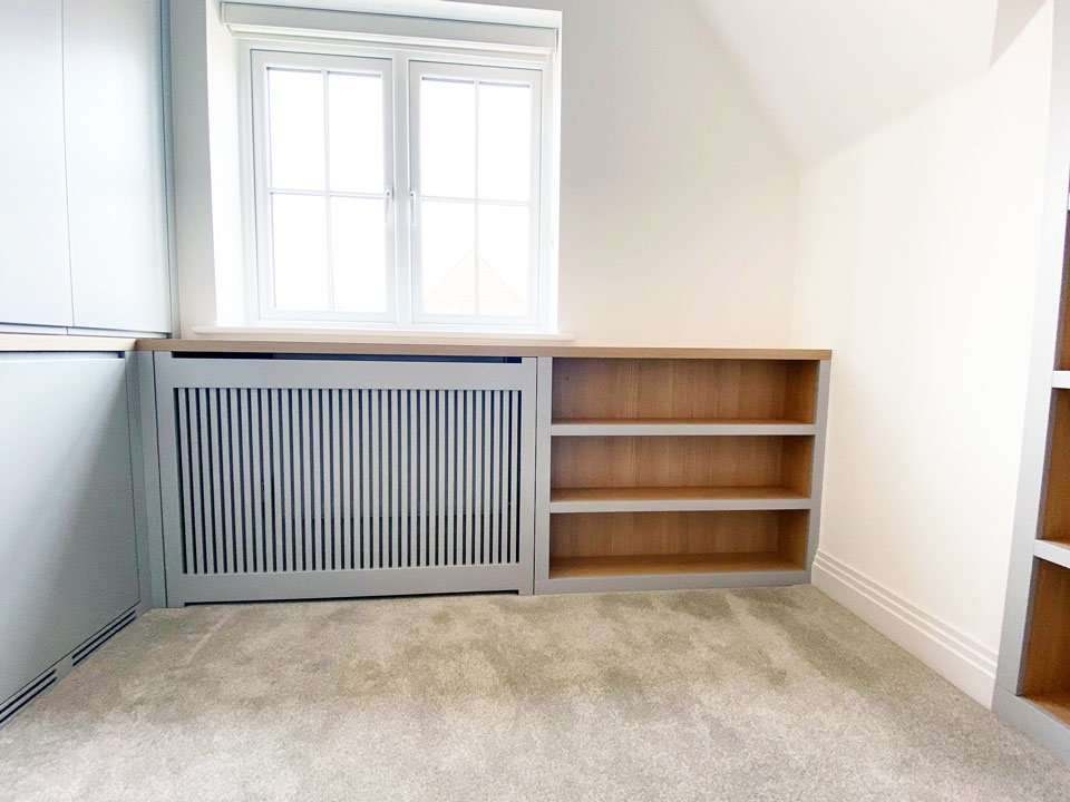 Bespoke home office with fitted desk, drawers and open shelving