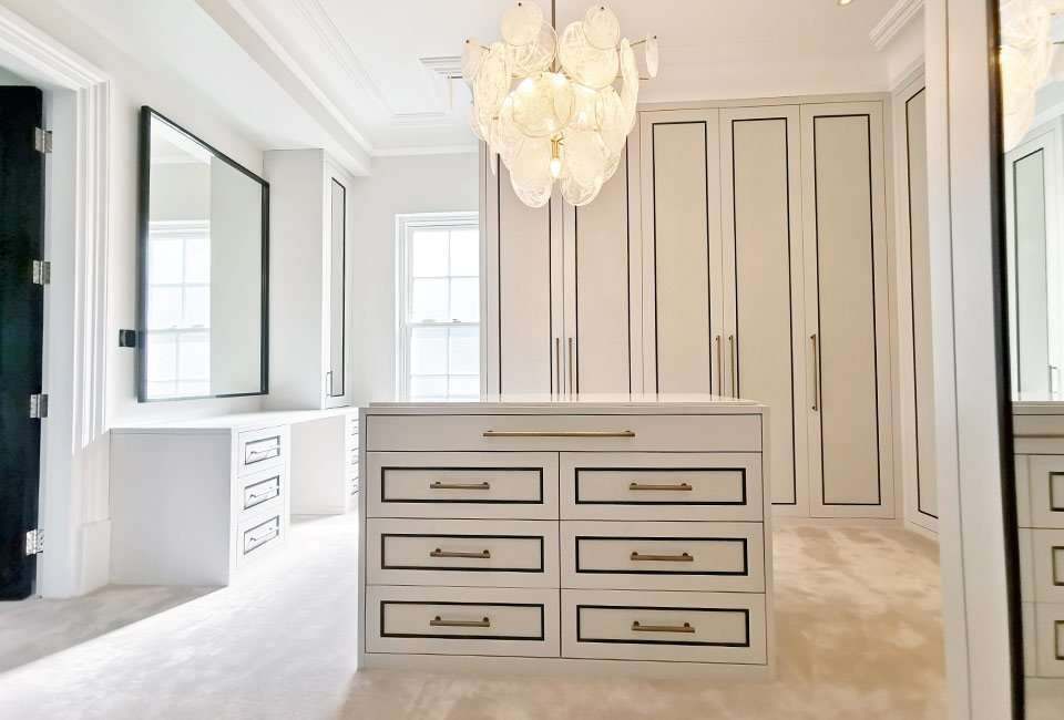The dressing table relocated beside the window, under a tall mirror