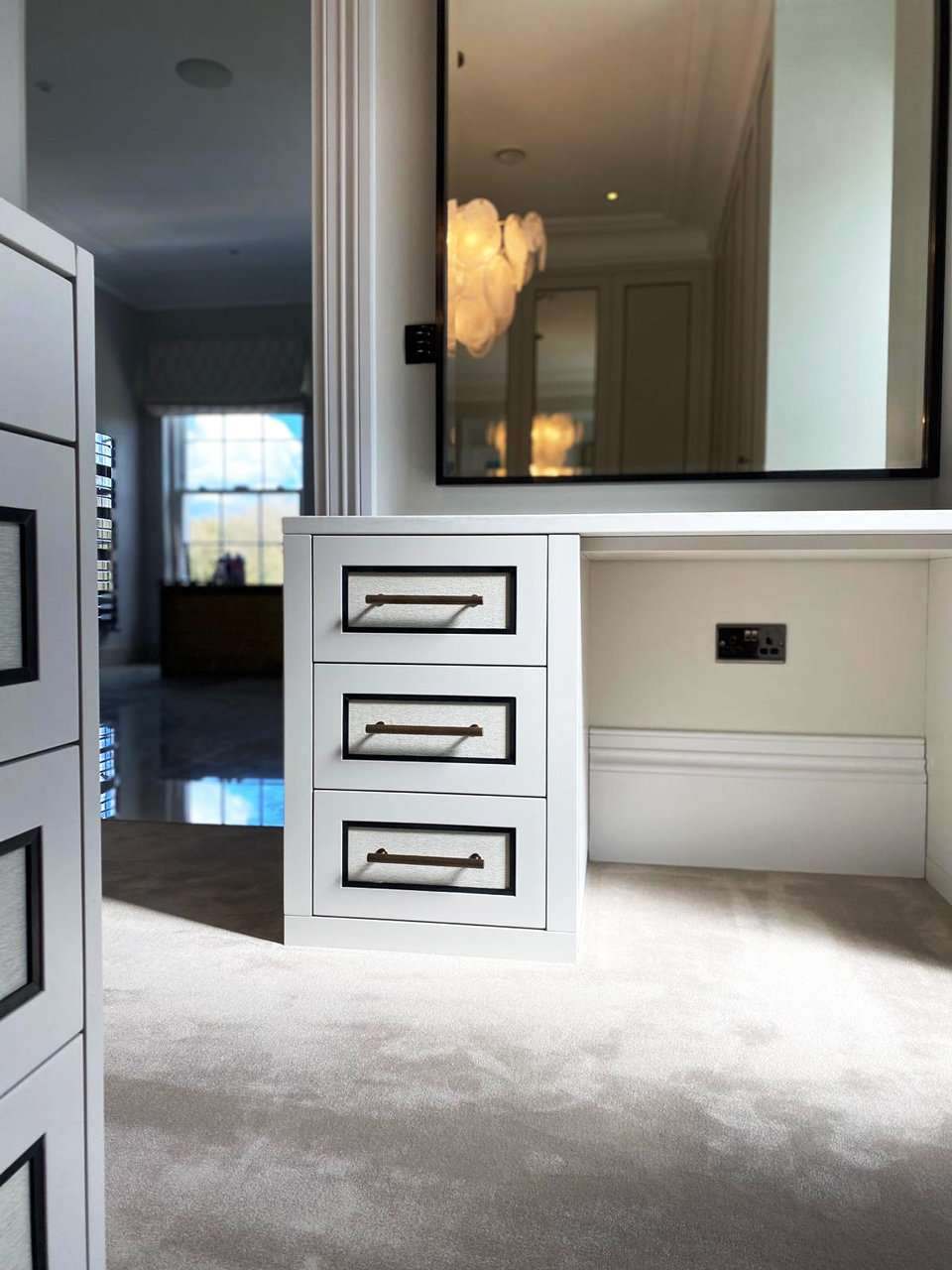 Full-height bespoke wardrobe with panelled doors
