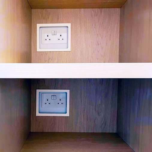 Fitted joinery wrapping around an awkward feature
